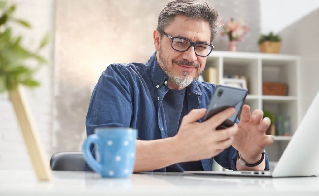man looking on phone