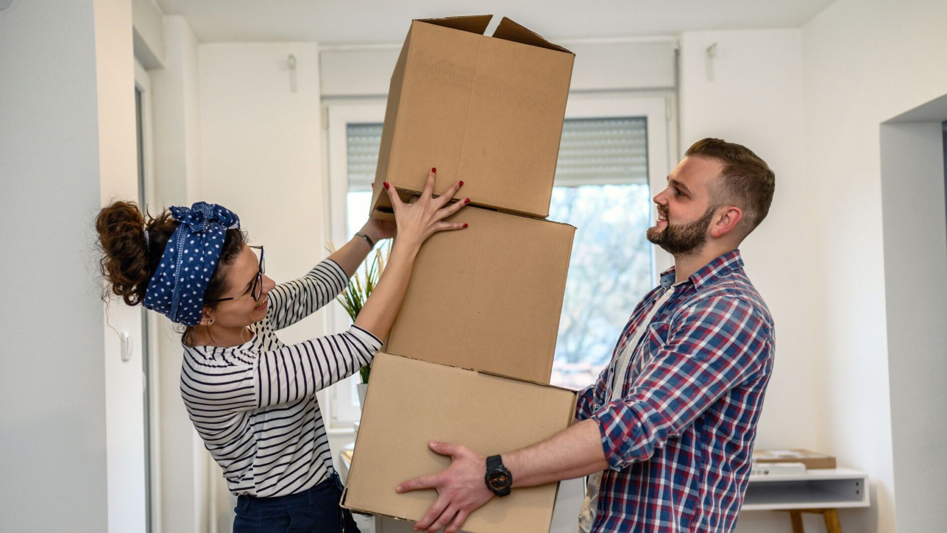 couple moving boxes